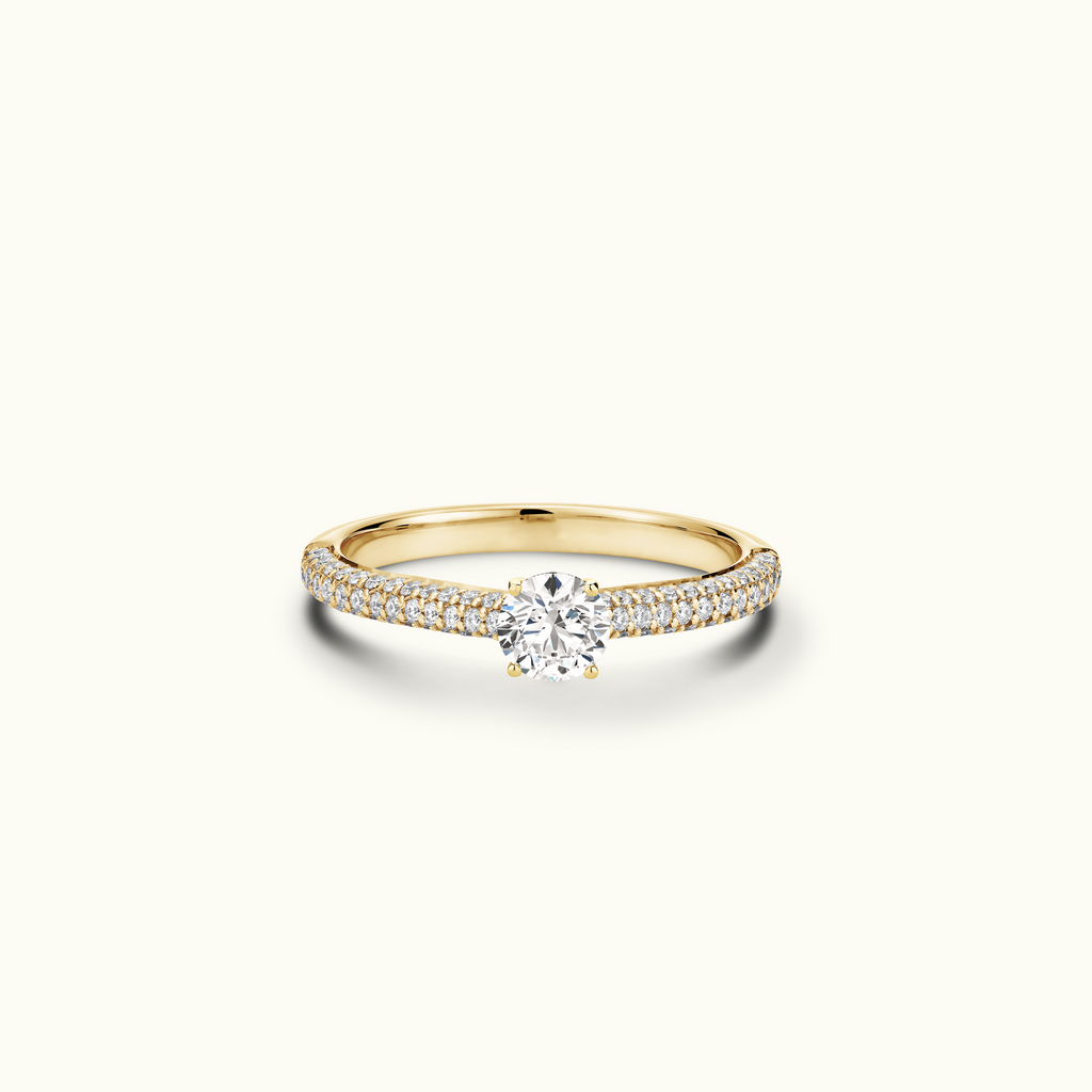 Jewellers District's Diamond Engagement Ring with Signature Knot-Basket and Micropavé Band in 14k Yellow Gold, Round