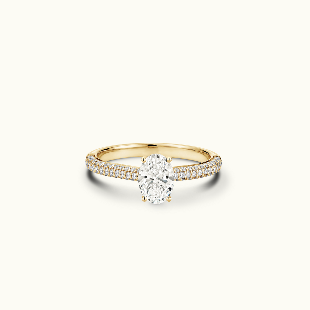 Jewellers District's Diamond Engagement Ring with Signature Knot-Basket and Micropavé Band in 14k Yellow Gold, Oval