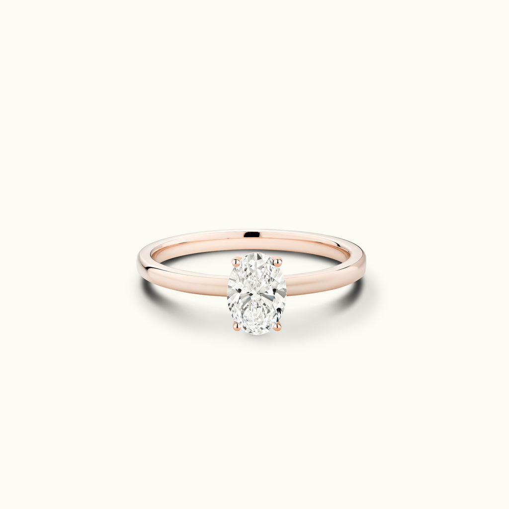 Jewellers District's Diamond Engagement Ring with Signature Knot-Basket and Accent Diamonds in 14k Rose Gold, Oval