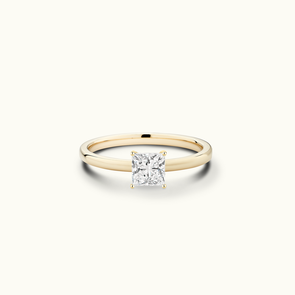 Jewellers District's Diamond Engagement Ring with Signature Knot-Basket and Accent Diamonds in 14k Yellow Gold, Princess