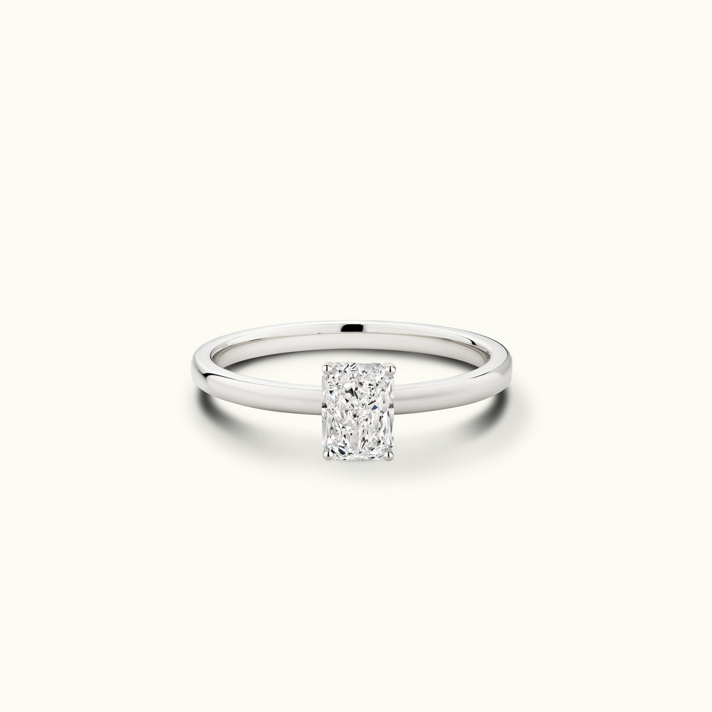 Jewellers District's Diamond Engagement Ring with Signature Knot-Basket and Accent Diamonds in 14k White Gold, Radiant