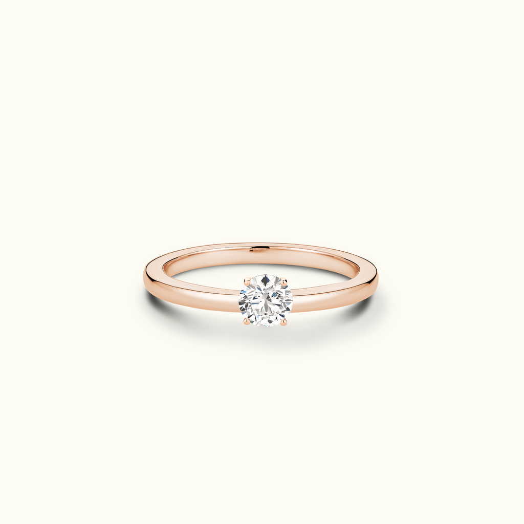 Jewellers District's Diamond Engagement Ring with Signature Knot-Basket and Diamond Prongs in 14k Rose Gold, Round