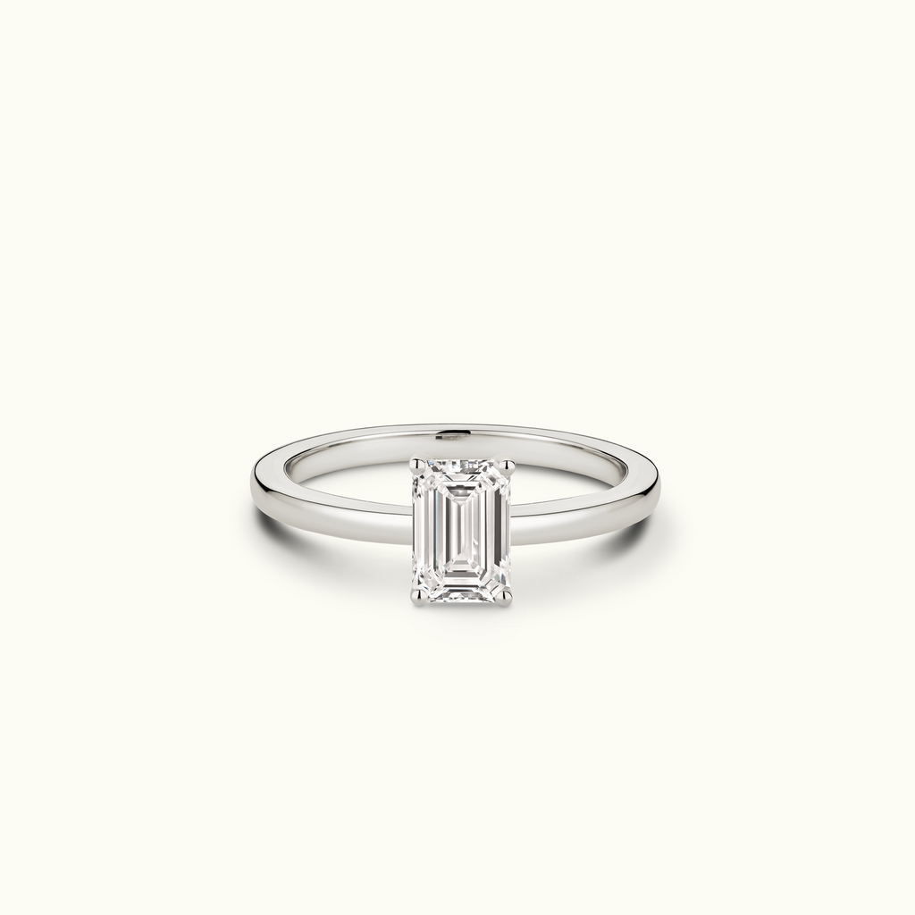 Jewellers District's Diamond Engagement Ring with Signature Knot-Basket and Diamond Prongs in 14k White Gold, Emerald