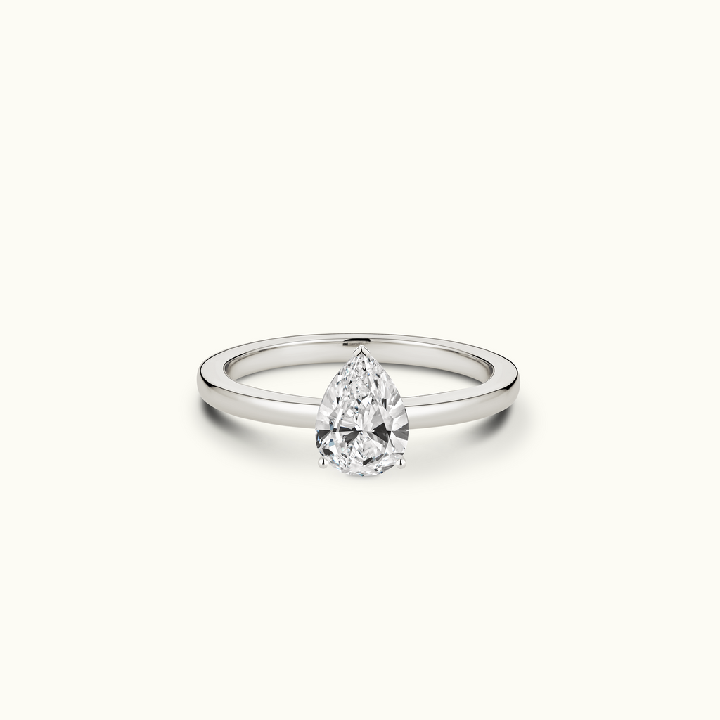 Jewellers District's Diamond Engagement Ring with Signature Knot-Basket and Diamond Prongs in 14k White Gold, Pear