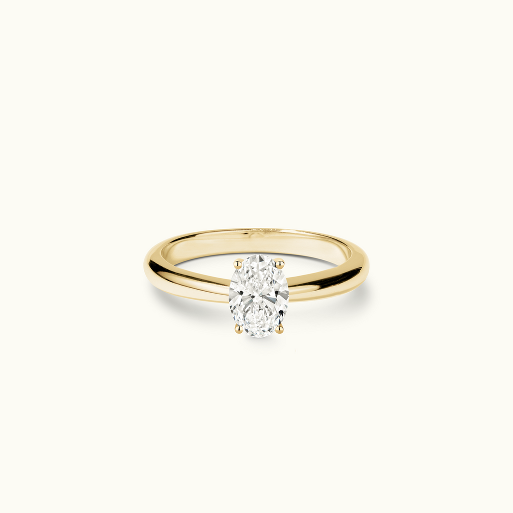 Jewellers District's Diamond Engagement Ring with Tapered Band in 14k Yellow Gold, Oval