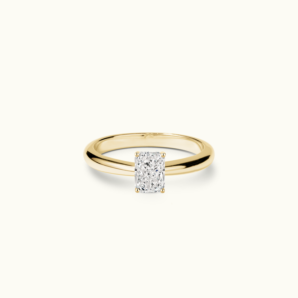 Jewellers District's Diamond Engagement Ring with Tapered Band in 14k Yellow Gold, Radiant