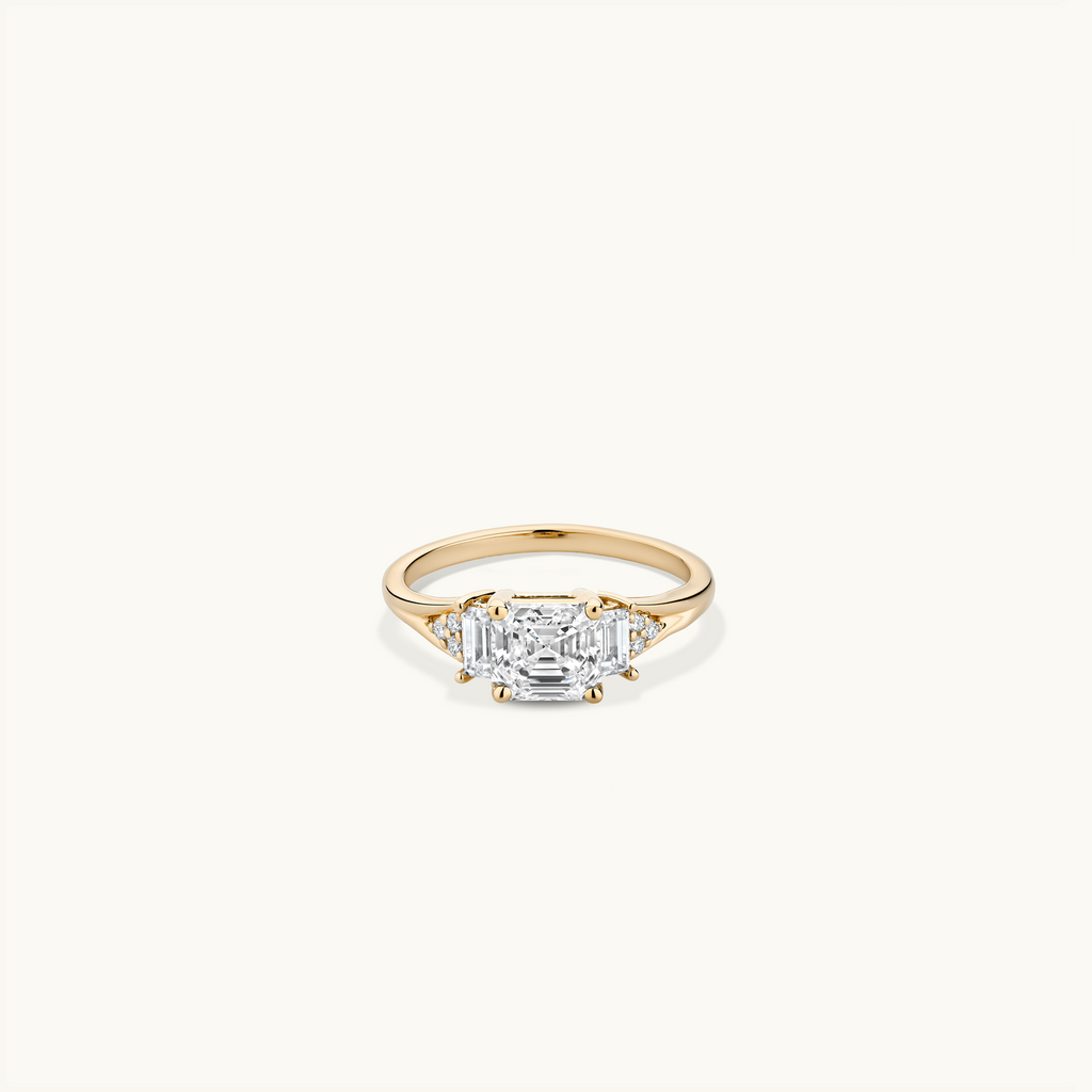 Jewellers District's Three-Stone Engagement ring with Cluster Side Diamonds in 14k Yellow Gold, Asscher