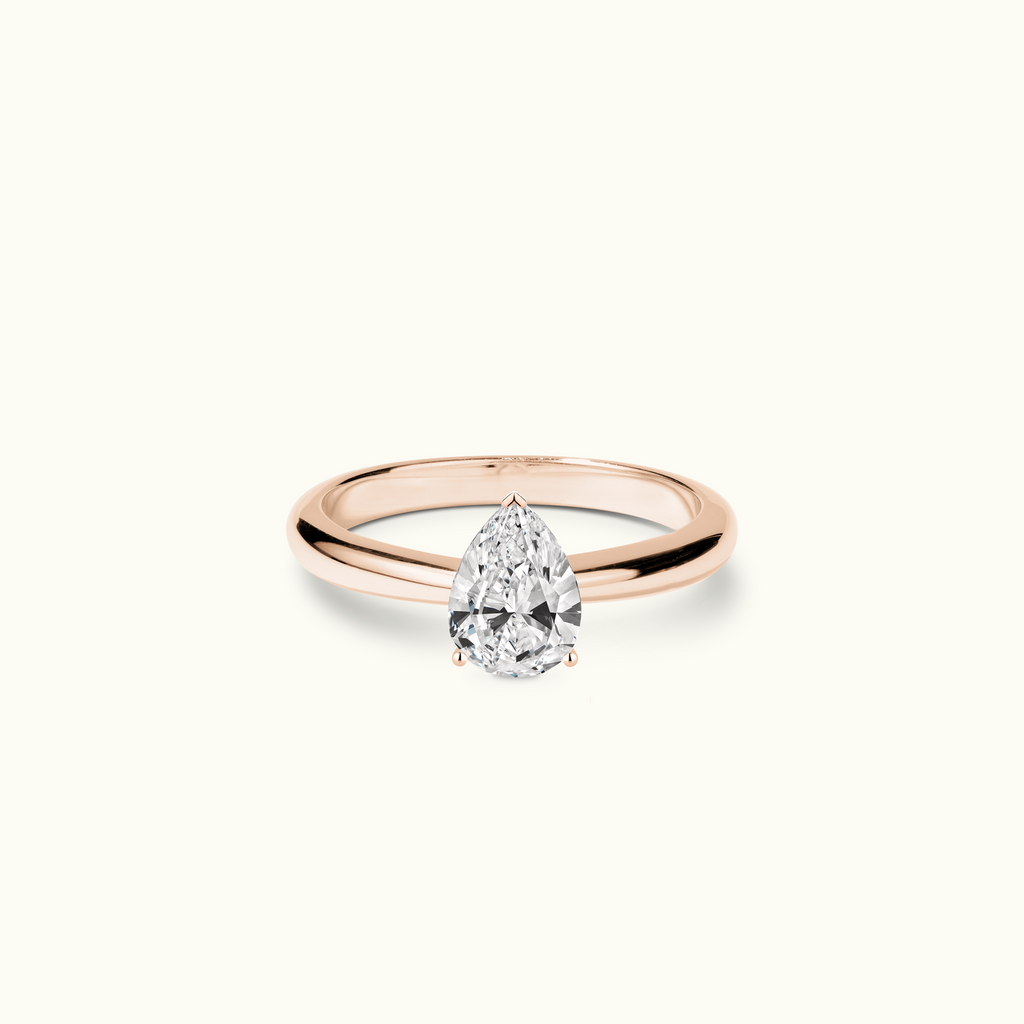 Jewellers District's Diamond Engagement Ring with Tapered Band in 14k Rose Gold, Pear