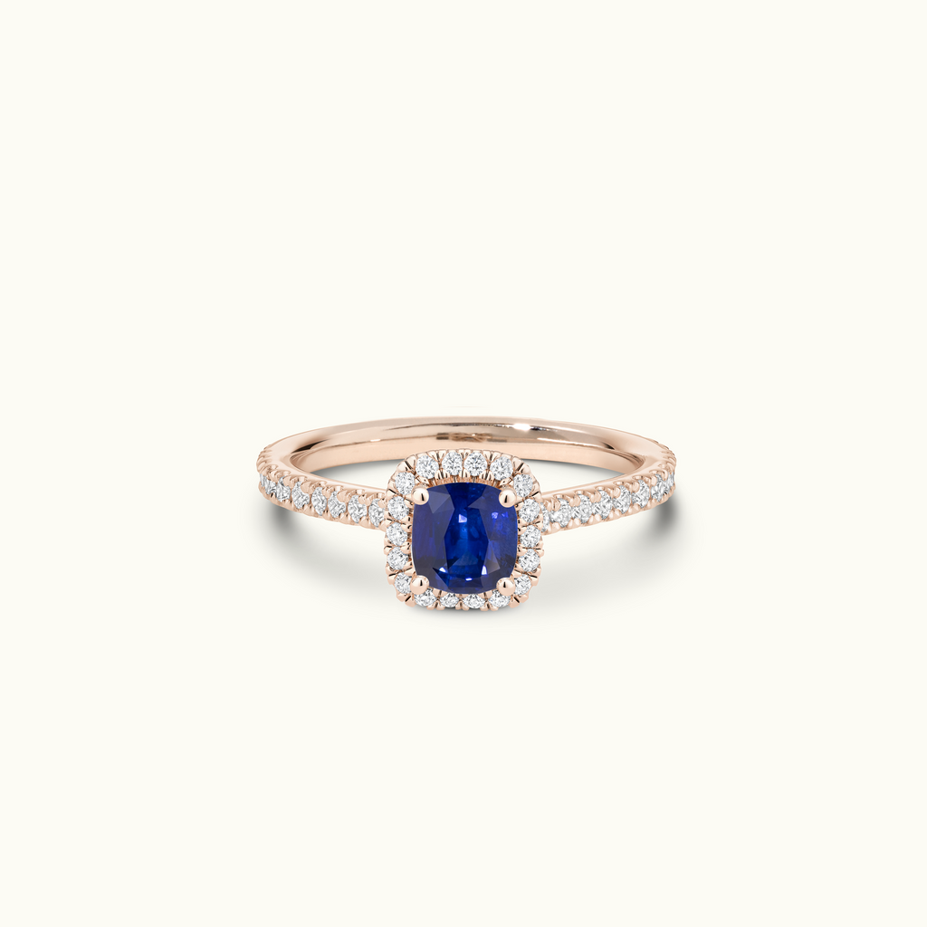 Jewellers District's Cathedral-Setting Royal Sapphire Halo Engagement Ring with Diamond Band in 14k Rose Gold, Cushion