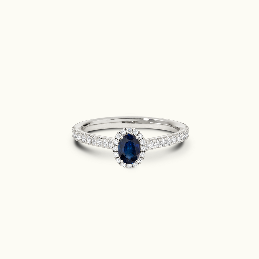 Jewellers District's Cathedral-Setting Royal Sapphire Halo Engagement Ring with Diamond Band in 14k White Gold, Oval