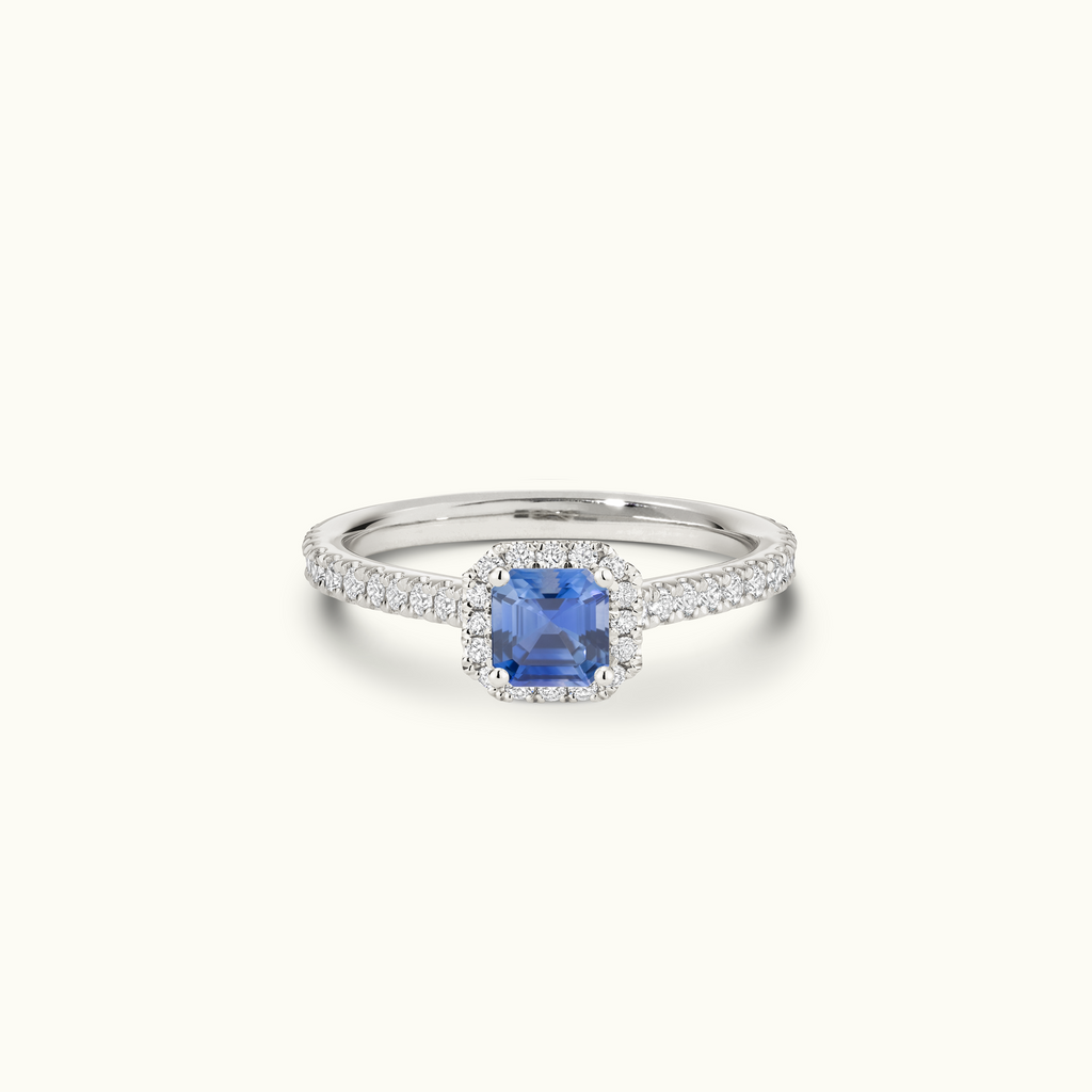 Jewellers District's Cathedral-Setting Royal Sapphire Halo Engagement Ring with Diamond Band in 14k White Gold, Asscher