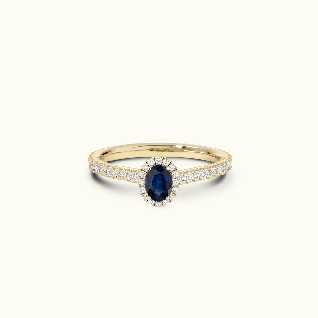 Jewellers District's Cathedral-Setting Royal Sapphire Halo Engagement Ring with Diamond Band in 14k Yellow Gold, Oval