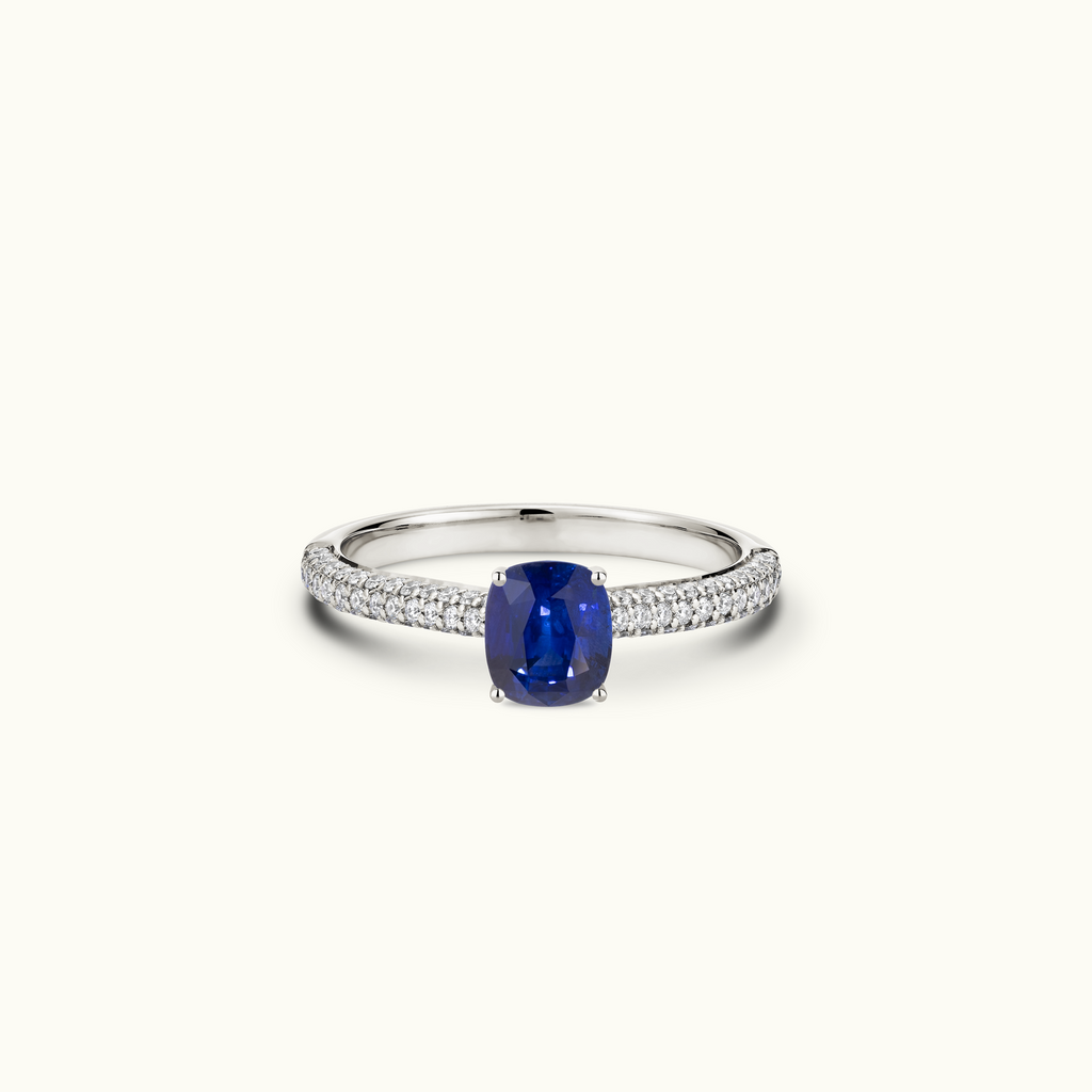 Jewellers District's Royal Sapphire Engagement Ring with Signature Knot-Basket and Micropavé Band in 14k White Gold, Cushion