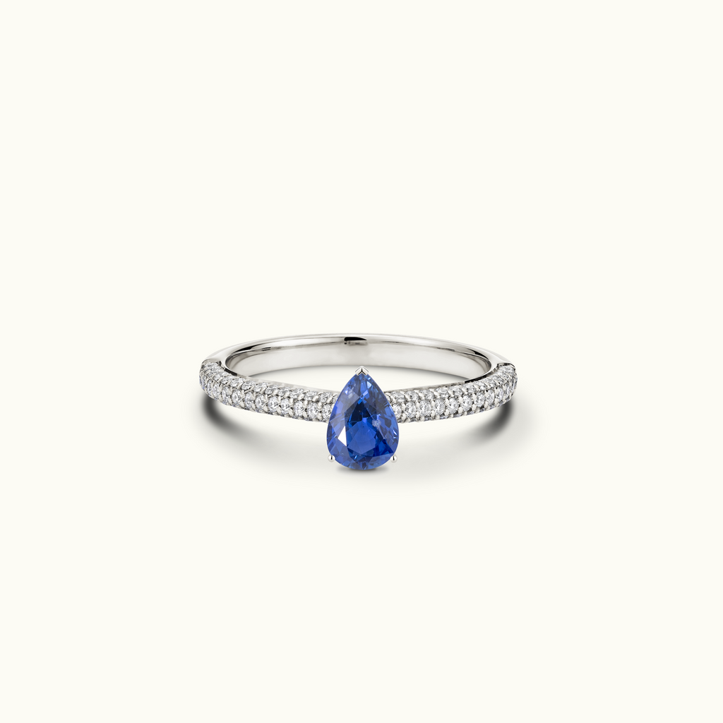 Jewellers District's Royal Sapphire Engagement Ring with Signature Knot-Basket and Micropavé Band in 14k White Gold, Pear