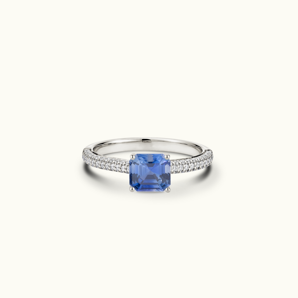 Jewellers District's Royal Sapphire Engagement Ring with Signature Knot-Basket and Micropavé Band in 14k White Gold, Asscher