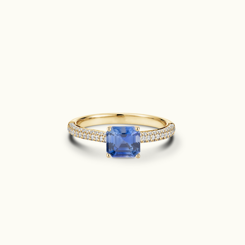 Jewellers District's Royal Sapphire Engagement Ring with Signature Knot-Basket and Micropavé Band in 14k Yellow Gold, Asscher