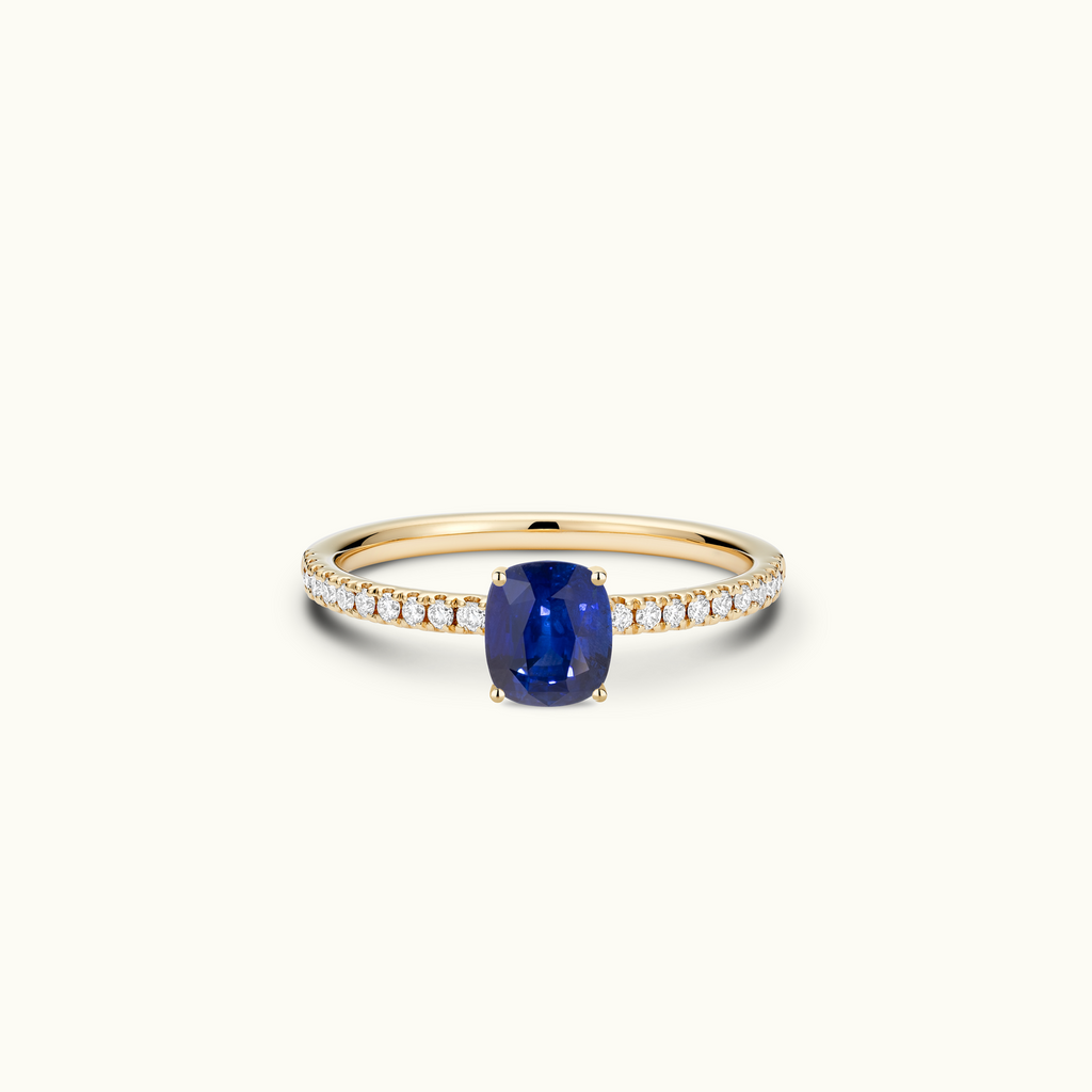 Jewellers District's Royal Sapphire Engagement Ring with Signature Knot-Basket and Diamond Band in 14k Yellow Gold, Cushion