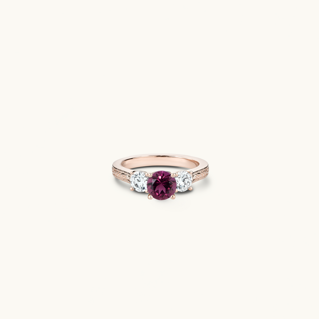 Jewellers District's Vintage Three-Stone Tourmaline Engagement Ring with Accent Diamonds in 14k Rose Gold, Round