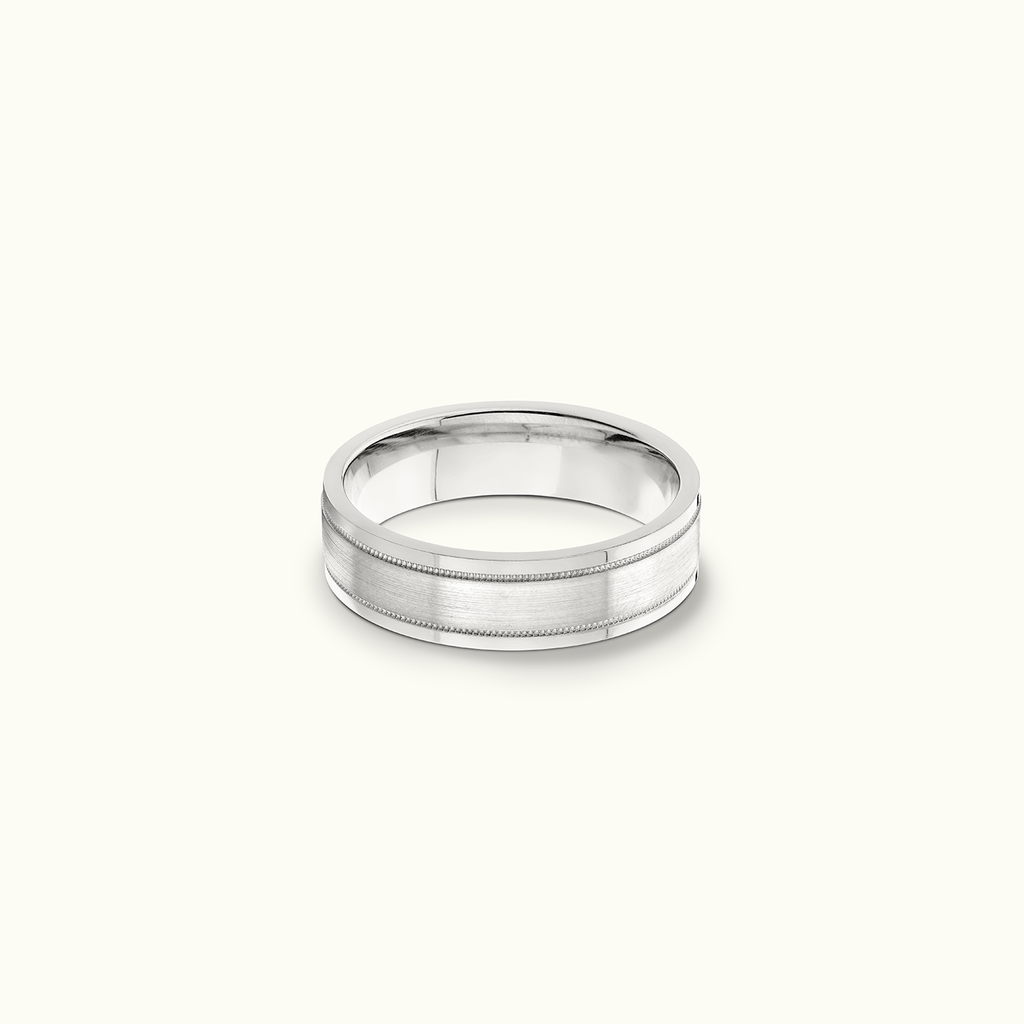 Face view of Jewellers District's Flat Two-Tone Beveled Wedding Ring in 14k White Gold, Band: 5mm