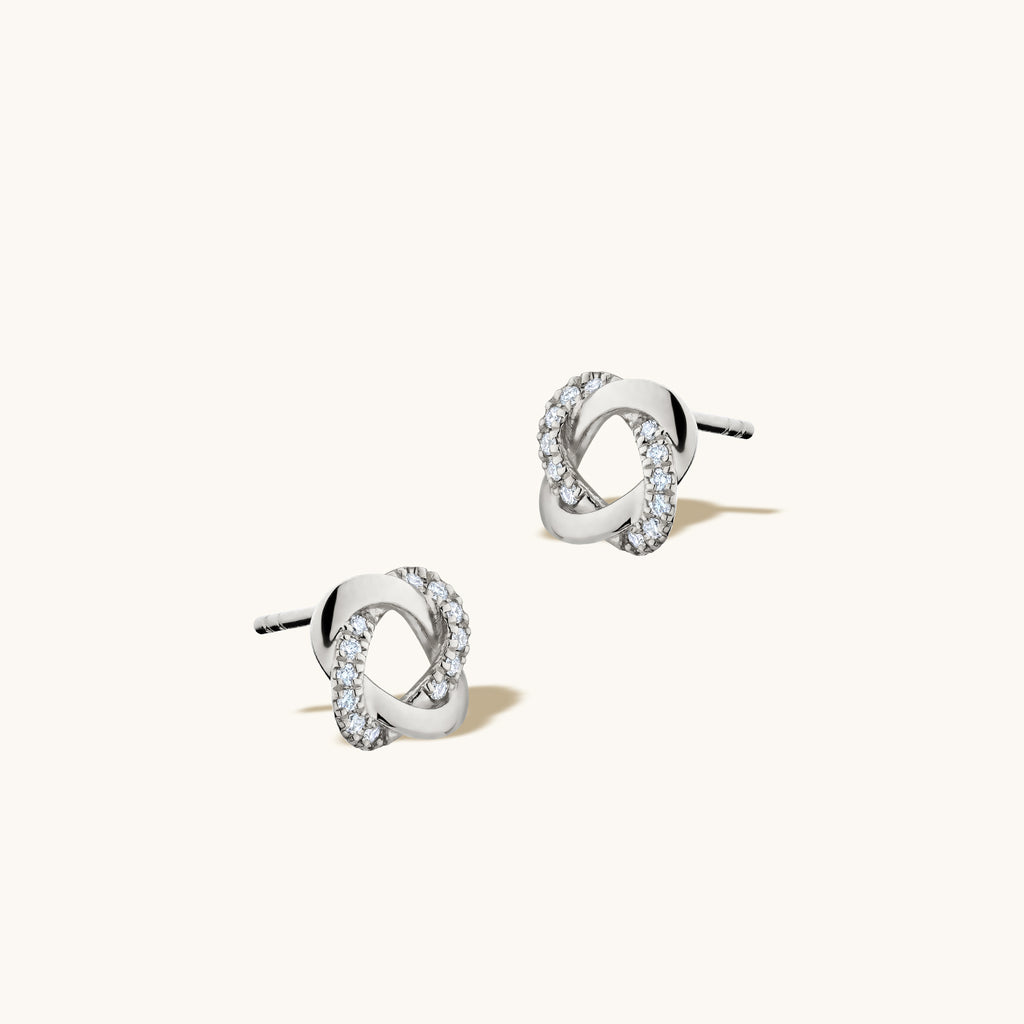 Angled view of Jewellers District's Twisted Diamond Pavé Studs in 10k White Gold