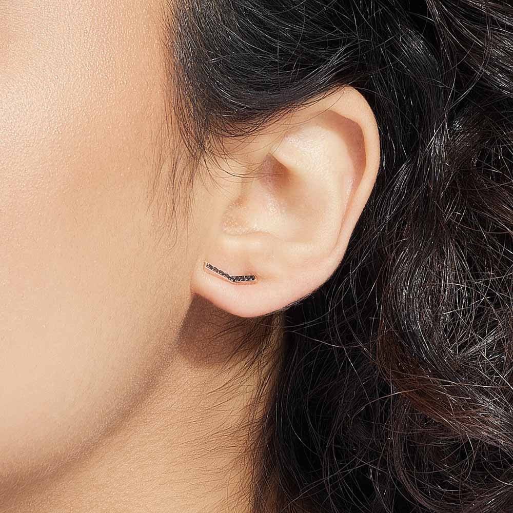 Model wearing Jewellers District's V-Shaped Stud Earrings with Accent Black Spinels in 14k Rose Gold #2