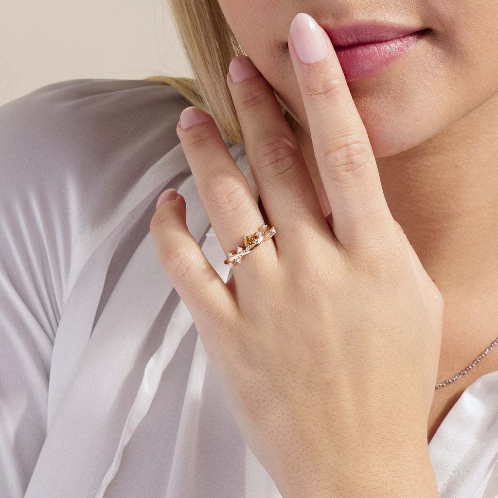 Model wearing Jewellers District's Cluster Imperial Topaz Ring with Accent Diamonds in 14k Rose Gold