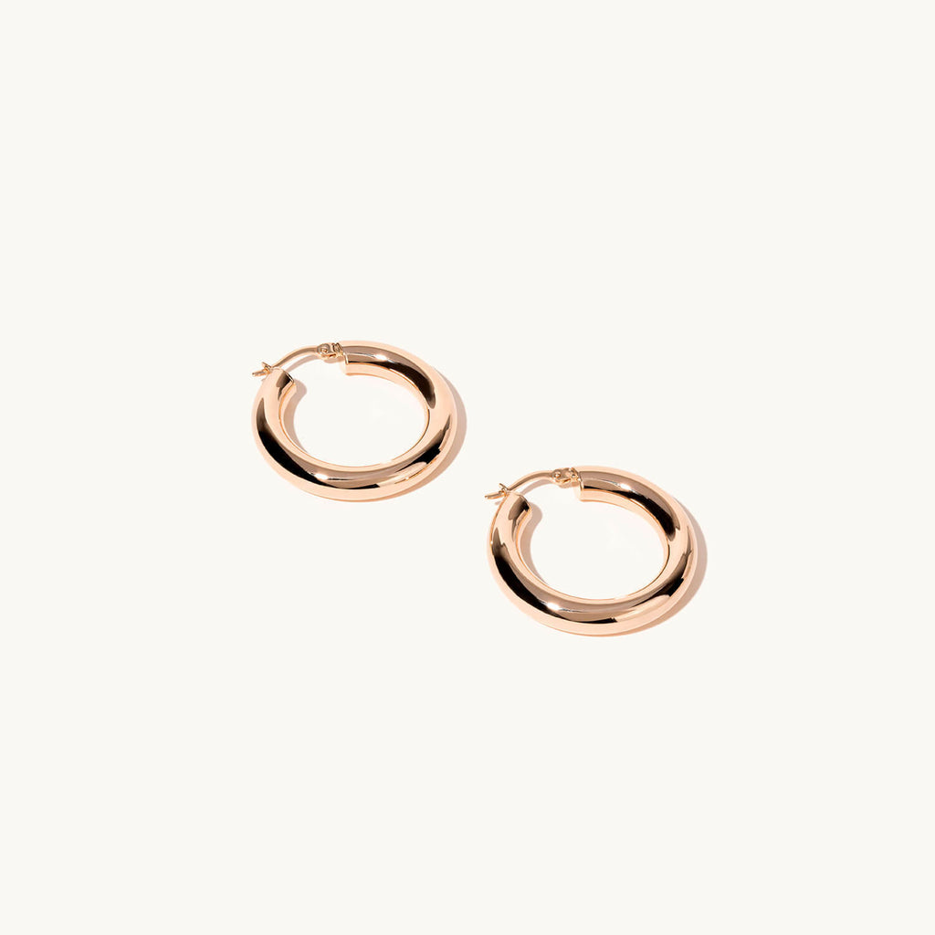 Profile view of Jewellers District's Bold Gold Hoop Earrings in 14k Rose Gold