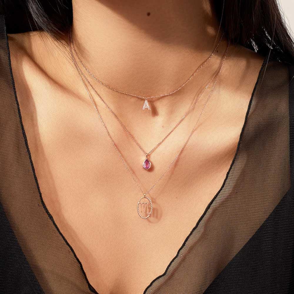 Model wearing Jewellers District's Initial Diamond Pavé Necklace : A in 14k Rose Gold #4