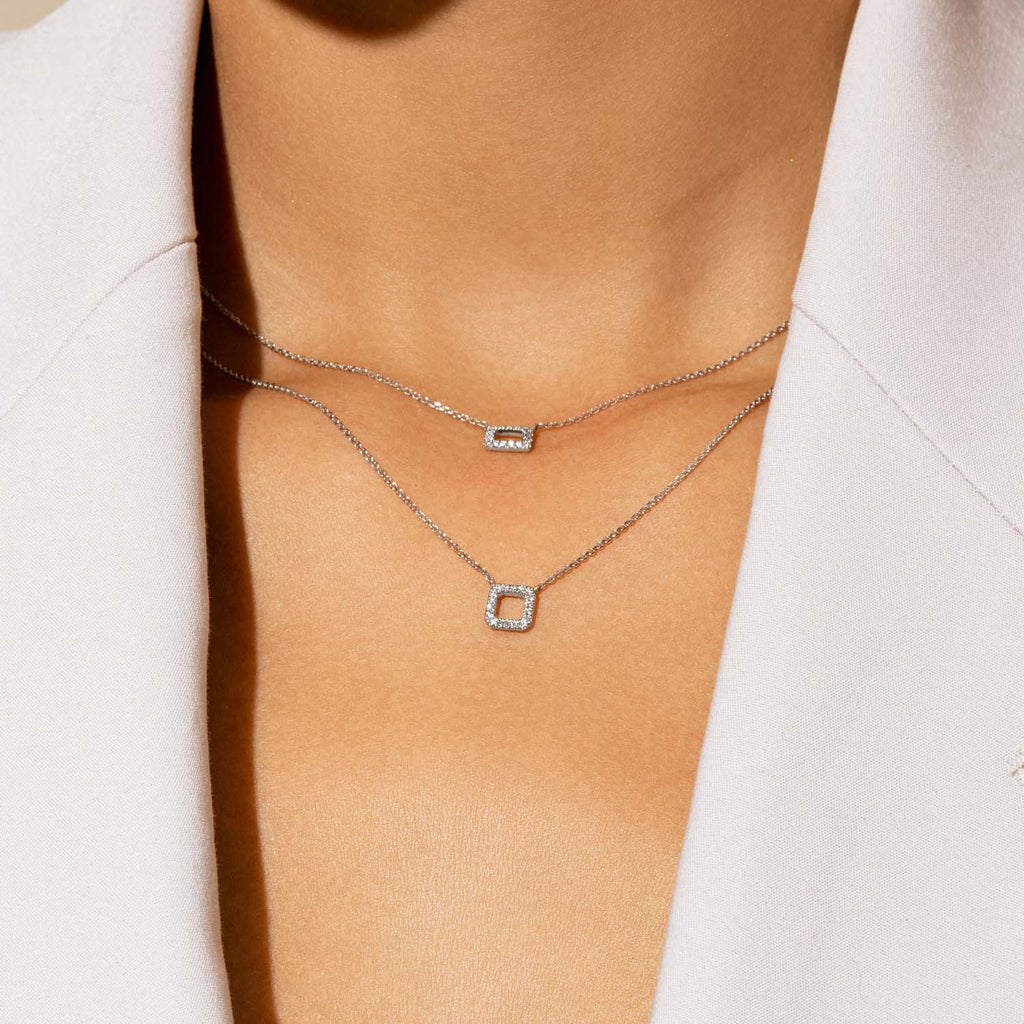 Model wearing Jewellers District's Rectangle Diamond Pavé Pendant Necklace in 14k White Gold