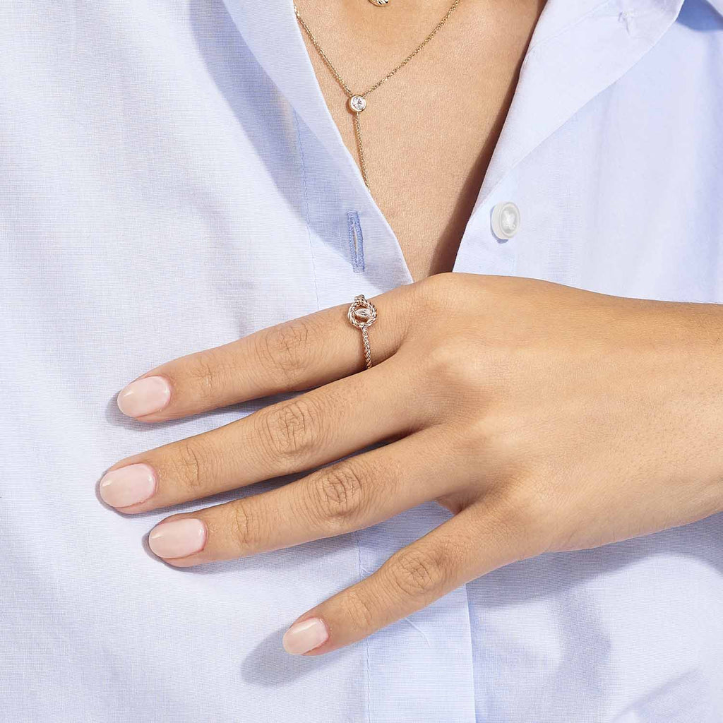 Model wearing Jewellers District's Twist Ring with Pear Cut Diamond in 14k Rose Gold #2