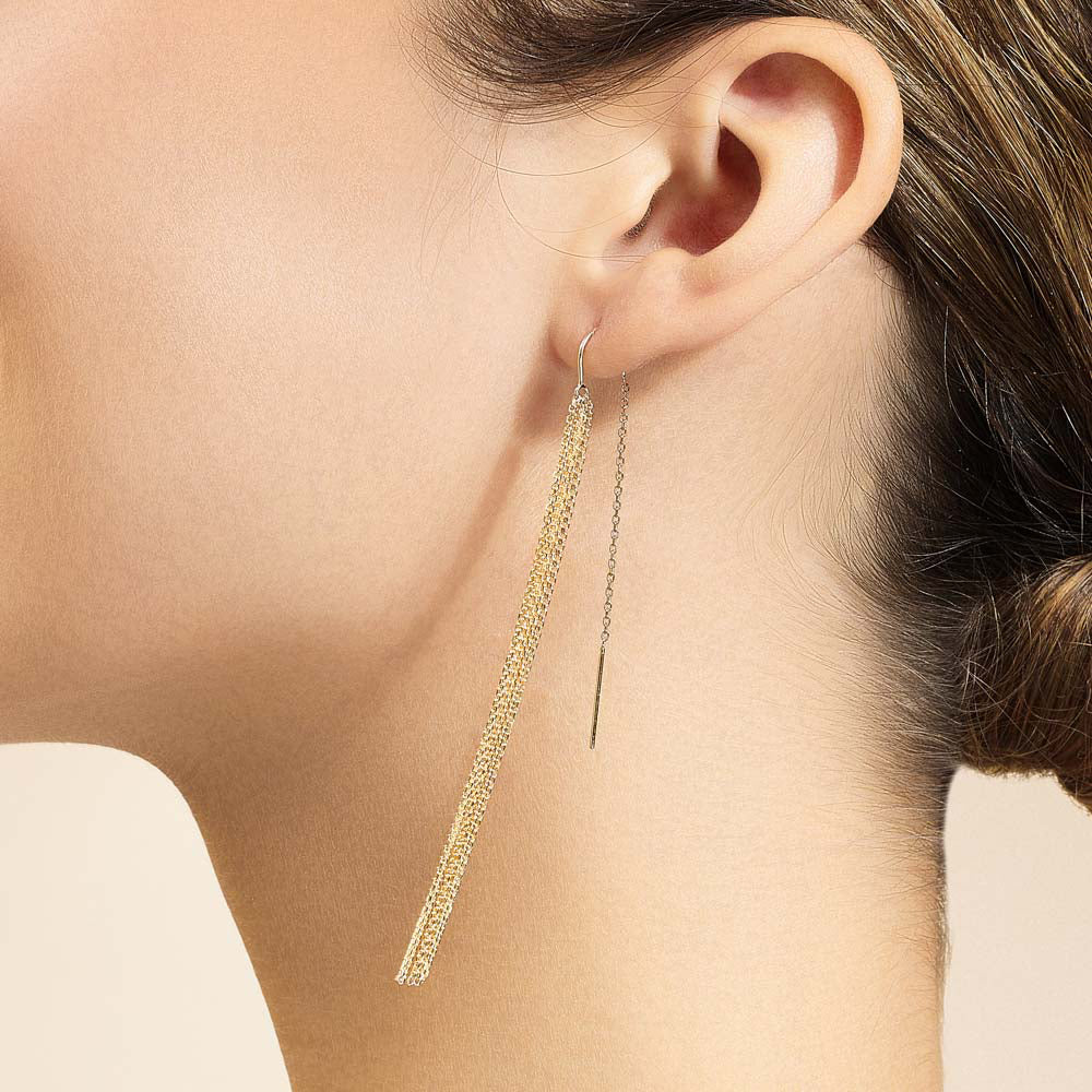 Model wearing Jewellers District's Gold Tassel Dangle Earrings in 14k Yellow Gold #3