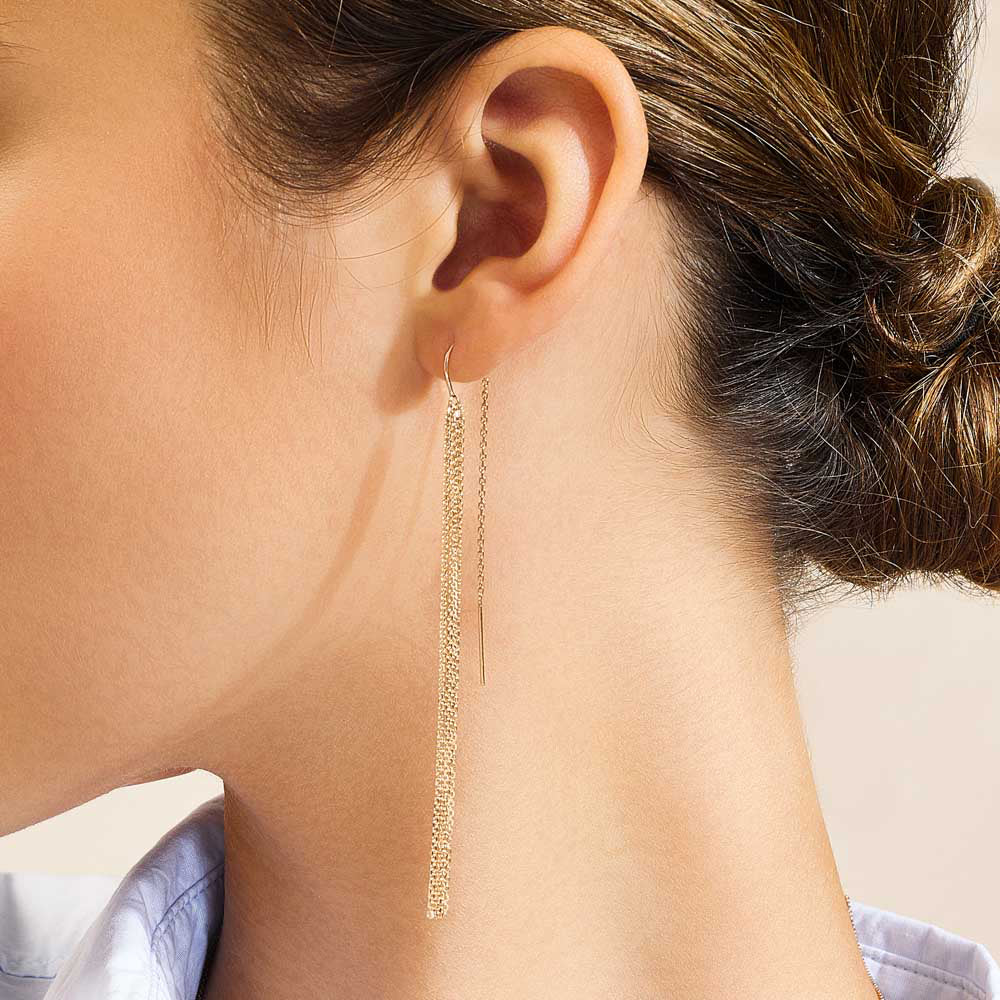 Model wearing Jewellers District's Gold Tassel Dangle Earrings in 14k Yellow Gold #5