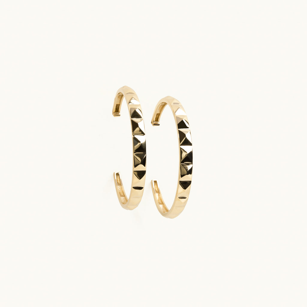 Jewellers District's Faceted Gold Hoop Earrings in 10k Yellow Gold