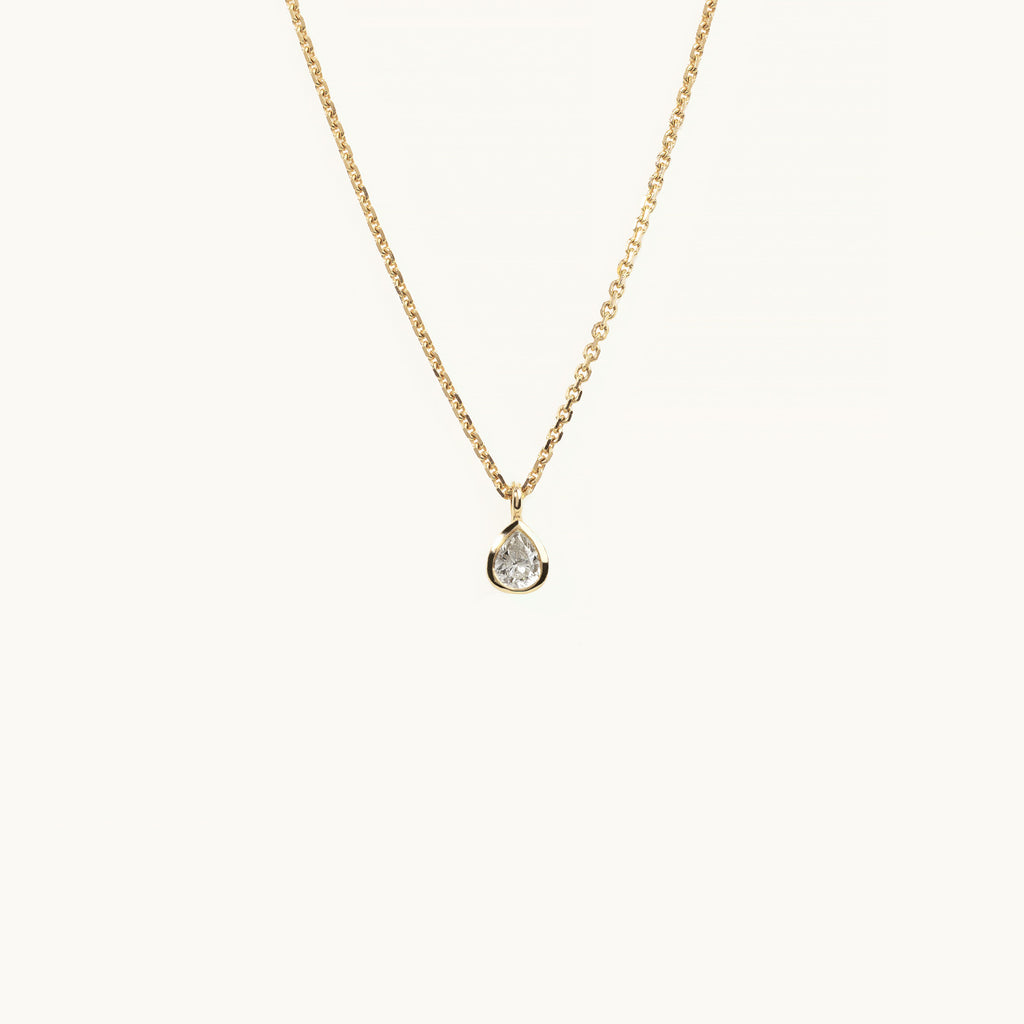 Jewellers District's Pear-Cut Bezel-Set Diamond Pendant Necklace in 10k Yellow Gold