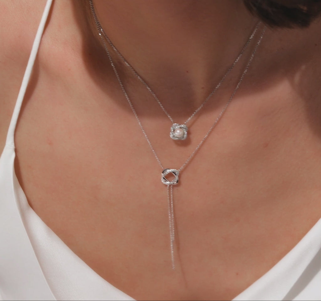 Model wearing Jewellers District's Twisted Freshwater Pearl Pendant Necklace with Diamond Pavé in 14k White Gold #2